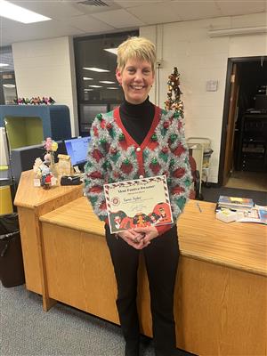 CES Staff Festive Sweaters 2024 5.jpg